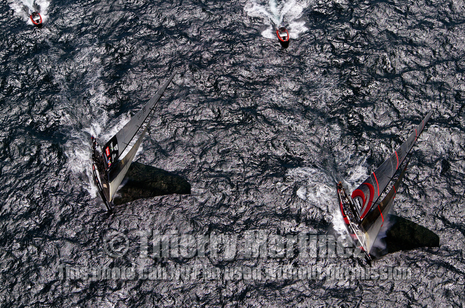 03_0894D © Th.Martinez. Auckland   New Zealand. 15 02 03 America's Cup Day 1.Alinghi (SUI64) vs Team New Zealand (NZL82) Alinghi leading on Team New Zealand before the gear damages append on NZL82