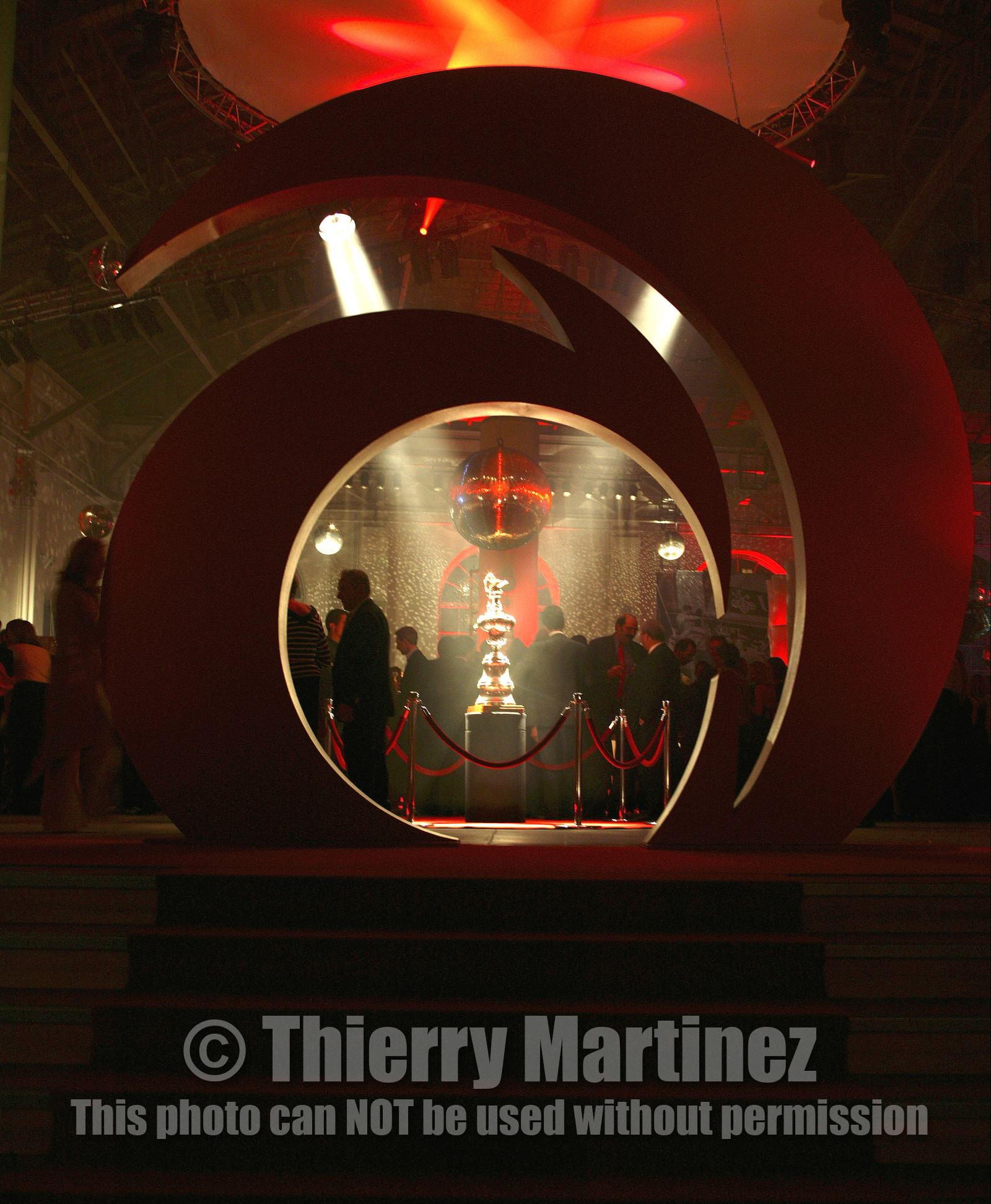 03_2286D ©Th.Martinez. Geneva , Switzerland. America's Cup 2003. 8th March 2003.Alinghi Team winner of America's Cup 2003..Private Party  for Alinghi victory in America's Cup, at BFM in Geneva.America's Cup in display at the Party..