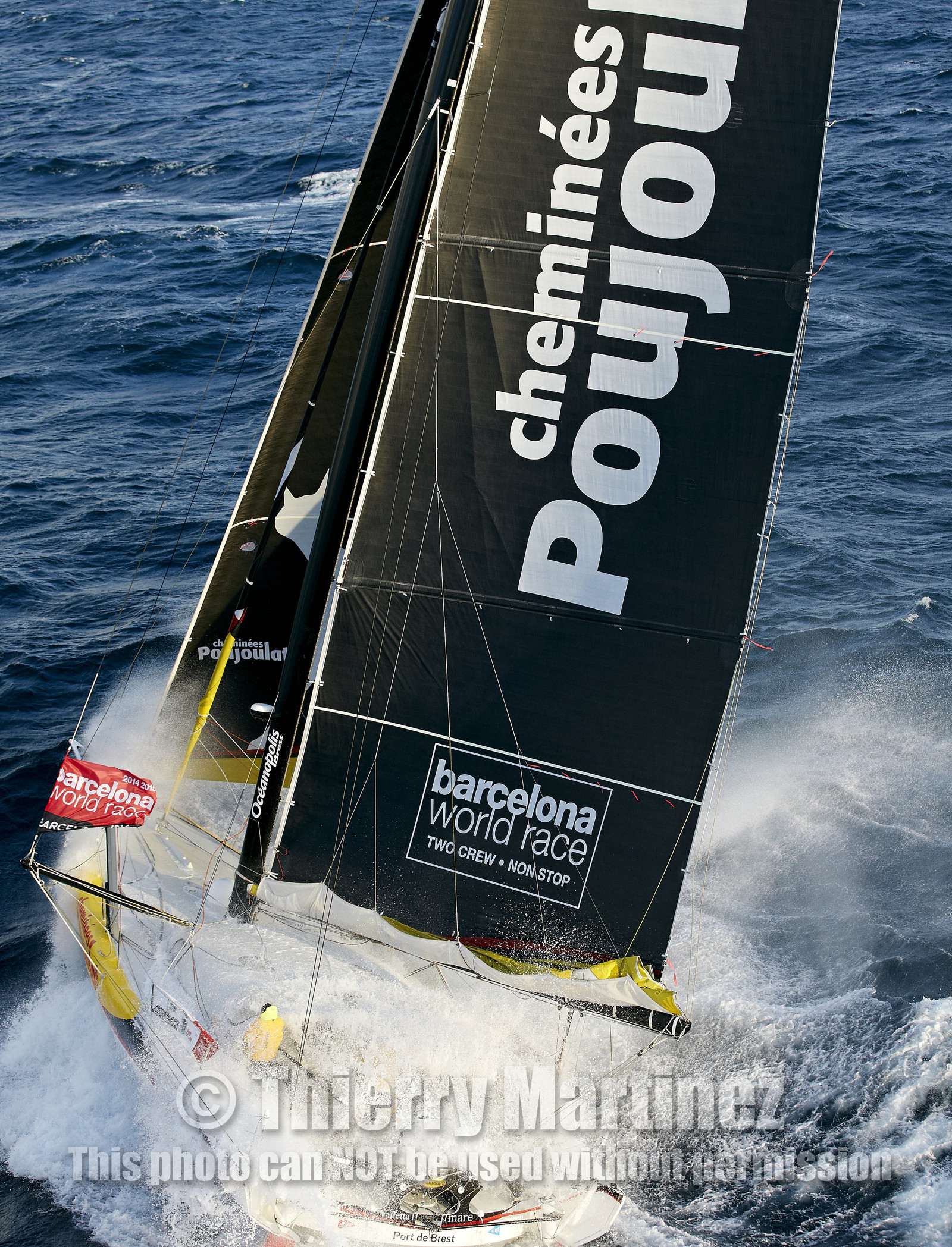 2014 BARCELONA WORLD RACE. Bernard Stamm (SUI) & Jean Le Cam (FRA) on CHEMINEES POUJOULAT