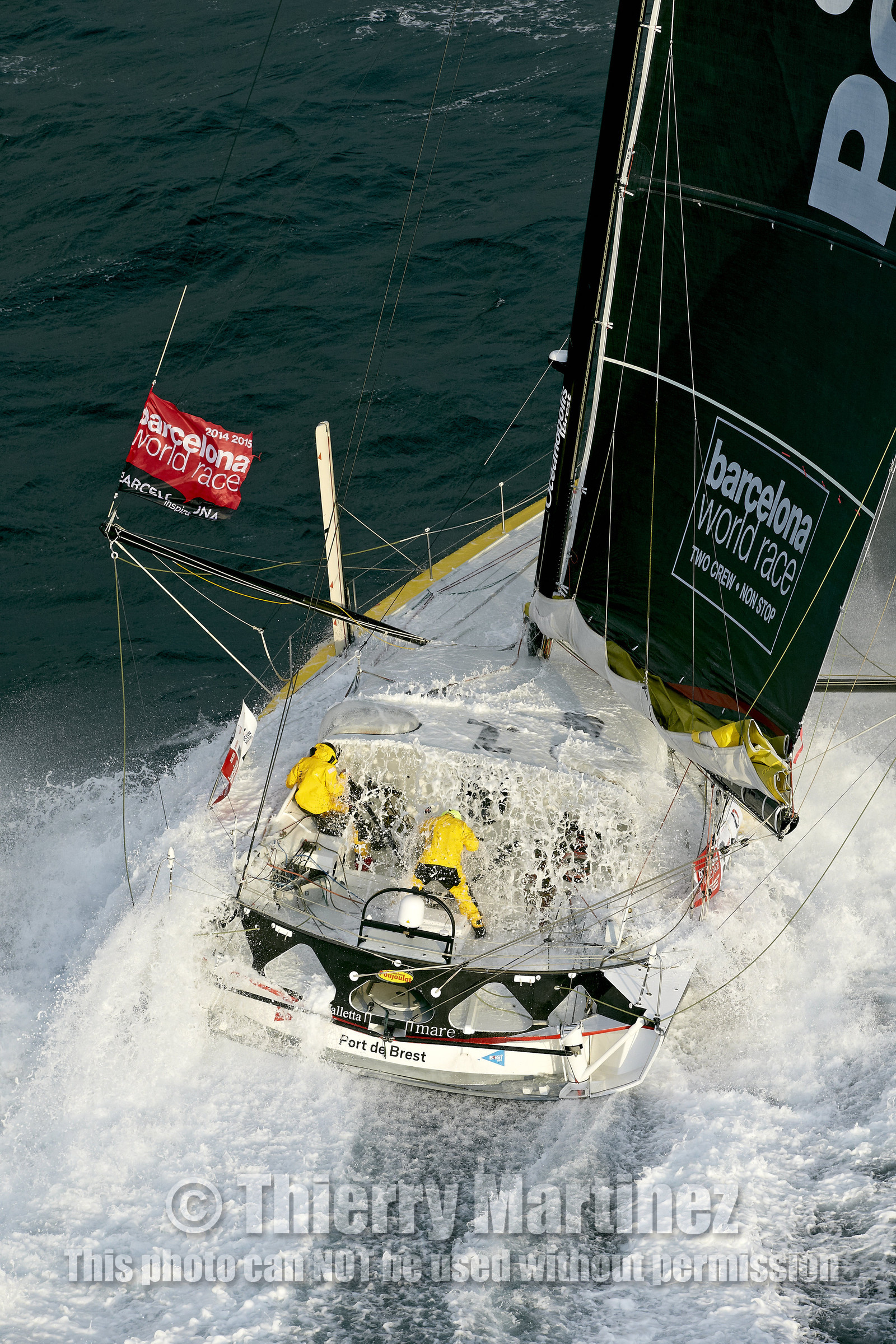 2014 BARCELONA WORLD RACE. Bernard Stamm (SUI) & Jean Le Cam (FRA) on CHEMINEES POUJOULAT