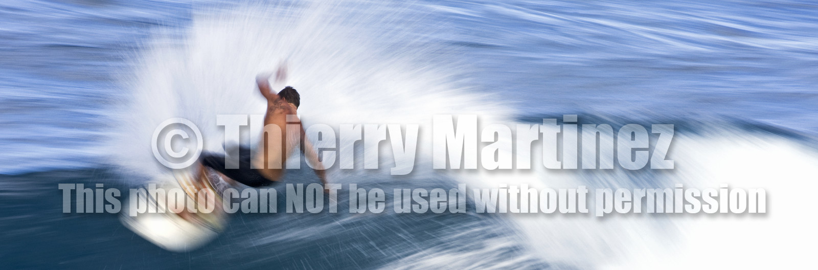 Surf in waves at Hookip'a Beach - North Shore Maui - Hawaii.