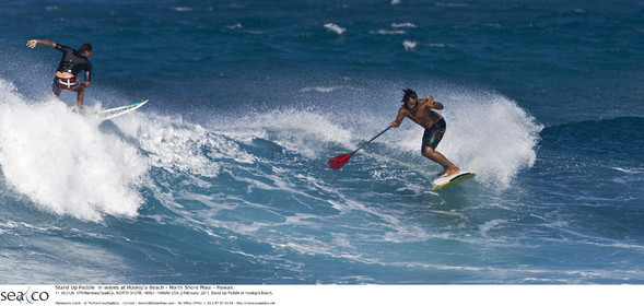 Stand Up Paddle  in waves at Hookip'a Beach - North Shore Maui - Hawaii.