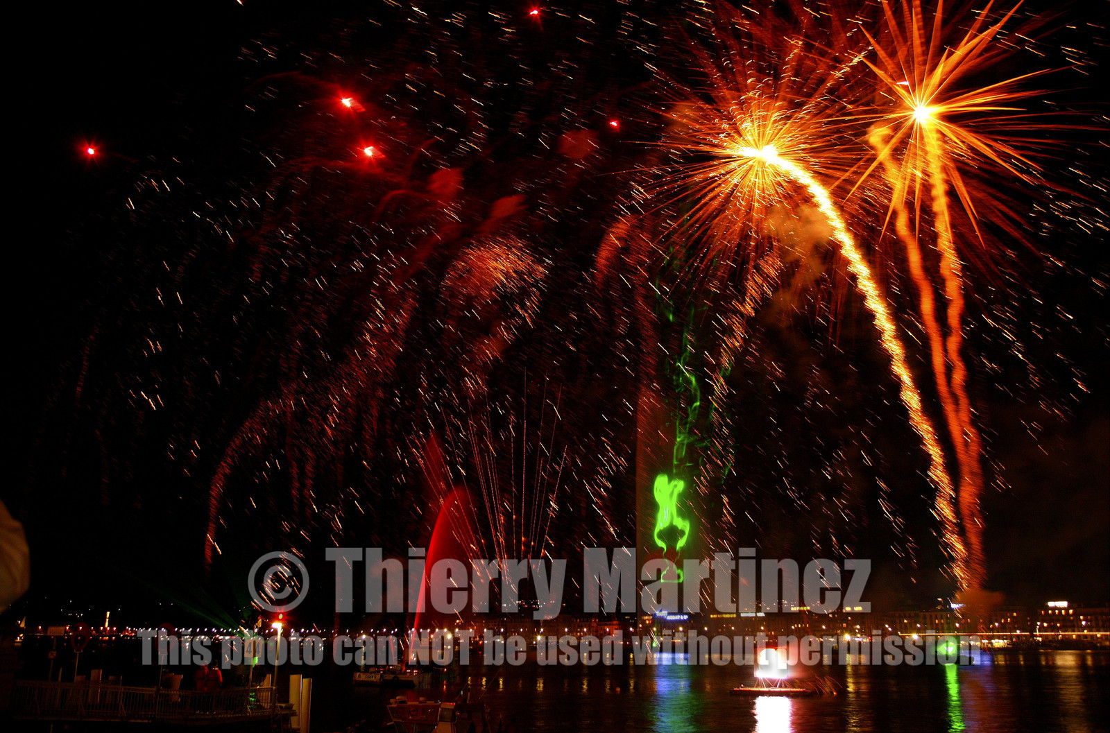 03_2266D ©Th.Martinez .Geneva , Switzerland. America's Cup 2003. 8th March 2003.Alinghi Team winner of America's Cup 2003..Welcome to Alinghi Team in Geneva.Firework and laser show by the lac...
