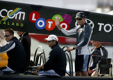 03_0149D ©Th.Martinez - Auckland (NZ) . America's Cup 2003. 15th February 2003. Day 1..Team NZ  NZL 82 leaving Vidauct Harbour to defend 31st America's cup against Challenger Team Alinghi in first race..Dean Barker Team NZ 's skipper at the helm and Hamish Pepper  , tactician, next to him waving to Team NZ fans.