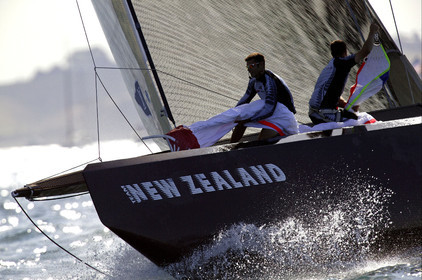 03_0215D ©Th.Martinez - Auckland (NZ) . America's Cup 2003. 18th February 2003. Day 2..Alinghi (SUI 64) vs Team NZ (NZL 82) .NZL 82 's crew setting up spinnaker and leading  SUI 64 at mark 3. Alinghi will over take Team NZ in the last leg and win with 7s on Team NZ.....