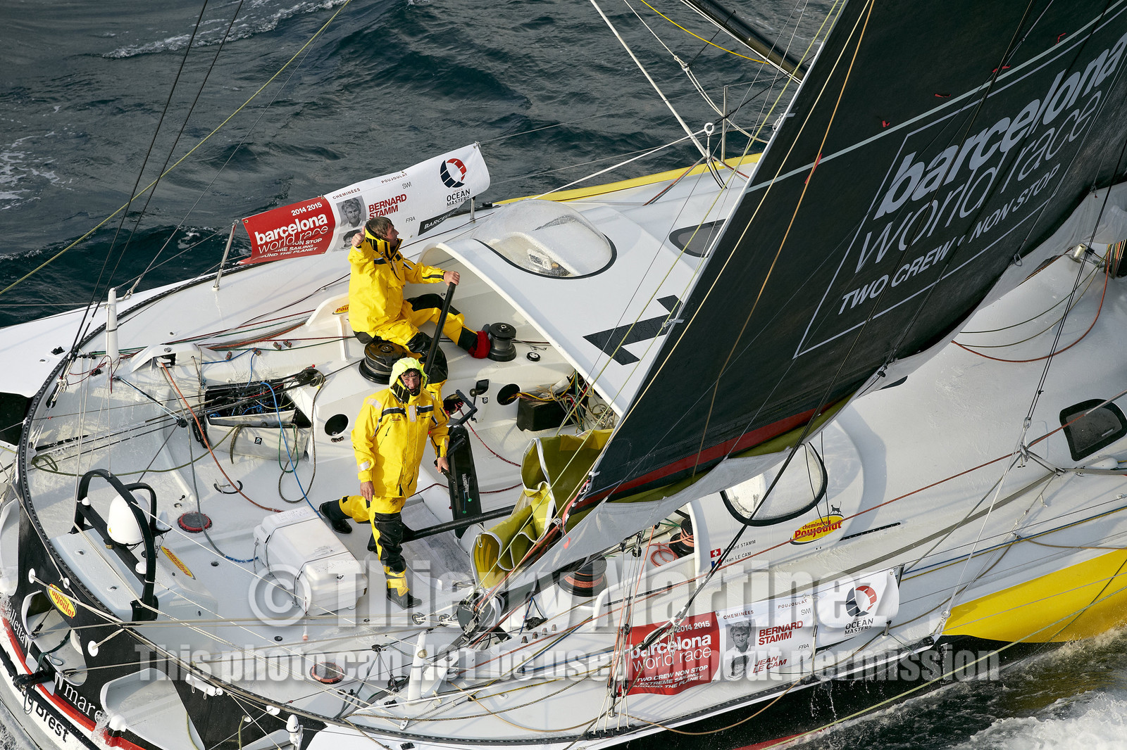 2014 BARCELONA WORLD RACE. Bernard Stamm (SUI) & Jean Le Cam (FRA) on CHEMINEES POUJOULAT