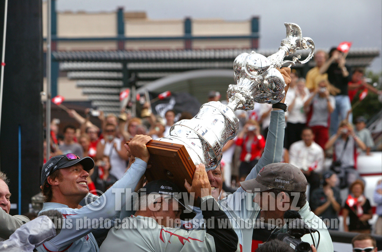 03_1424D © Th.Martinez . Auckland   New Zealand. 2nd March 2003 America's Cup 2003. Day 5, Alinghi (SUI64) vs Team New Zealand (NZL82). .Alinghi winner of the 31st America's Cup (5-0). Docking ceremony, presentation of the America's Cup in the Viaduct Bassin.Alinghi skipper