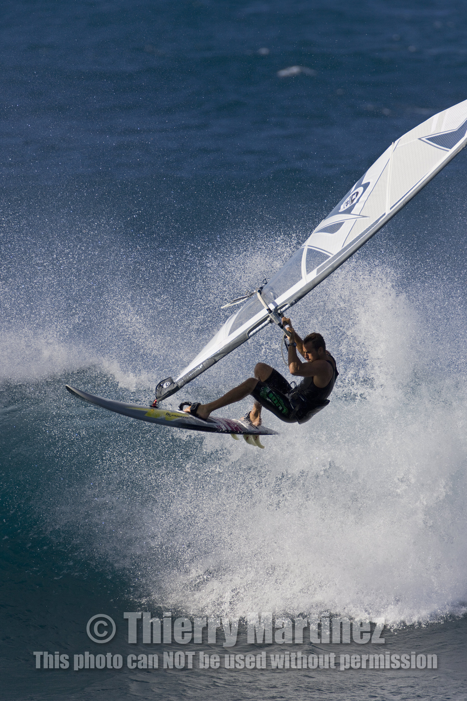 Windsurf in waves at Hookip'a Beach - North Shore Maui - Hawaii.