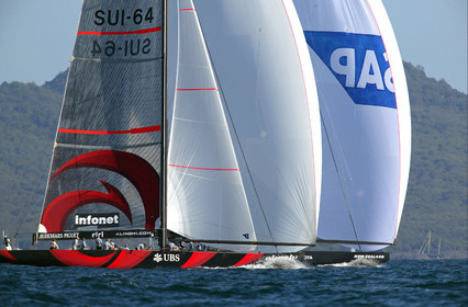 03_0952D © Th.Martinez  Auckland   New Zealand. 16 February 2003 America's Cup 2003, Day 2.Alinghi (SUI64) vs Team New Zealand (NZL82) Alinghi Team positionning SUi64 to block the air of Team New Zealand