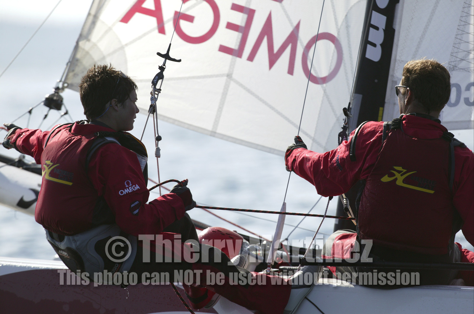 03_3142D  © Th.Martinez,STOCKHOLM ARCHIPELAGO - SWEDEN8 07 03-Archipelago Raid (2003)  Day 1..OMEGA NICK MOLONEY (AUS) at the helm and Ellen MacArthur (UK) at the navigation