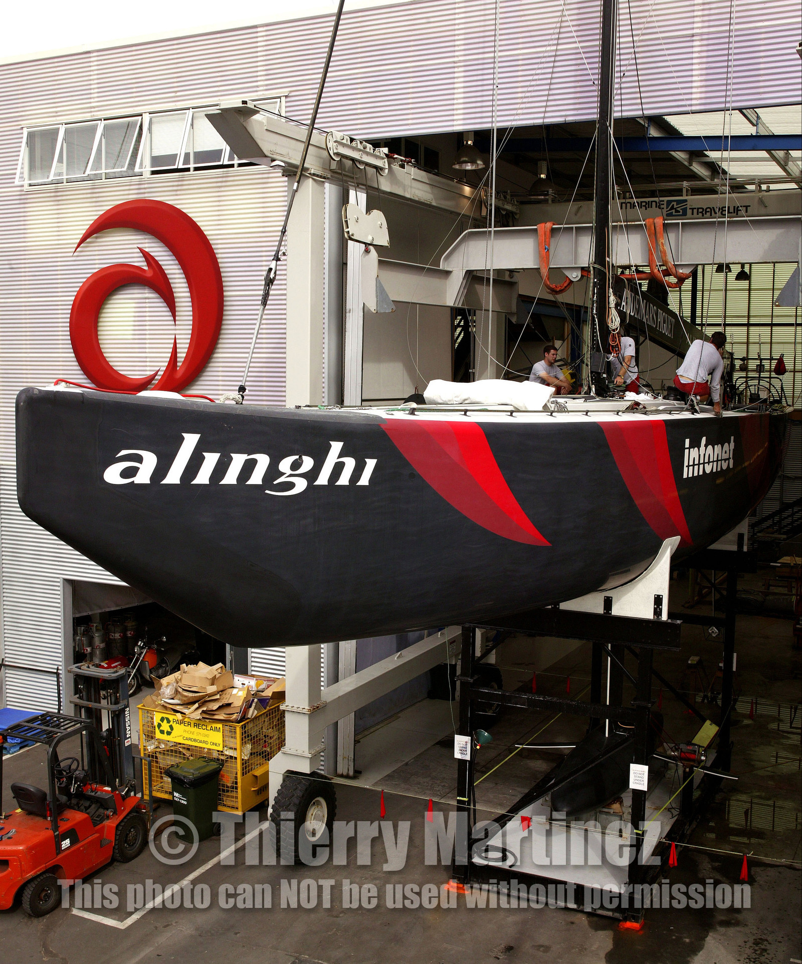 03_1065D © Th.Martinez Auckland   New Zealand. 24th February 2003  America's Cup 2003. Day 4, Race cancelled lack of wind. Alinghi (SUI64) vs Team New Zealand (NZL82)For fourth times in row race day 4 of the America's Cup 2003 have been cancelled. The two race boat have been left in sheds. SUI 64 in her shed..