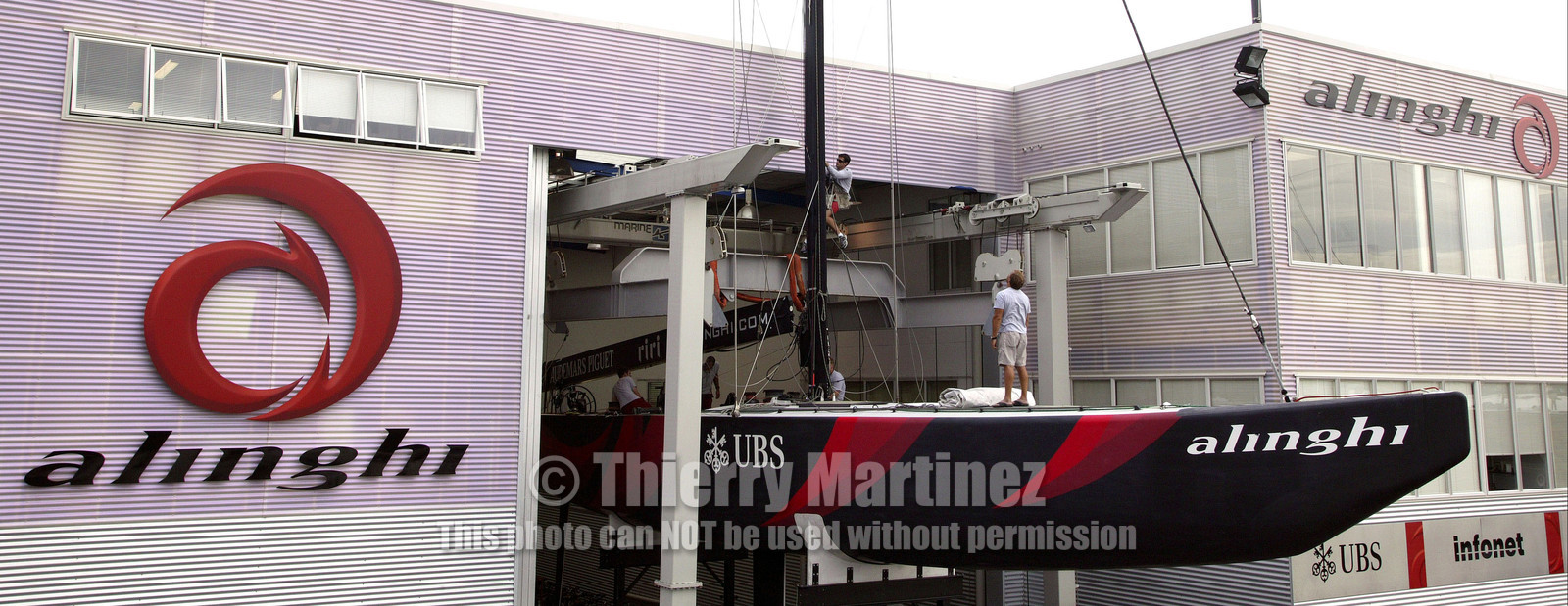 03_1061D © Th.Martinez Auckland   New Zealand. 24th February 2003  America's Cup 2003. Day 4, Race cancelled lack of wind. Alinghi (SUI64) vs Team New Zealand (NZL82)For fourth times in row race day 4 of the America's Cup 2003 have been cancelled . SUI 64 , Alinghi'race boats have been left in shed..