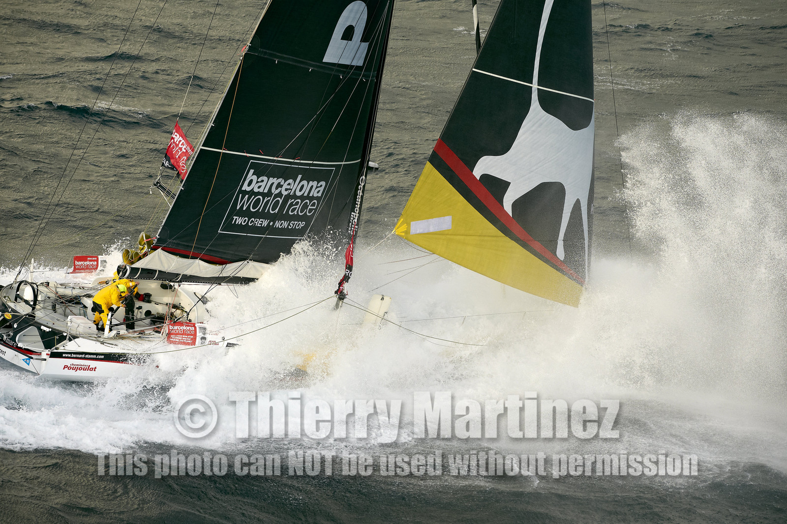 2014 BARCELONA WORLD RACE. Bernard Stamm (SUI) & Jean Le Cam (FRA) on CHEMINEES POUJOULAT