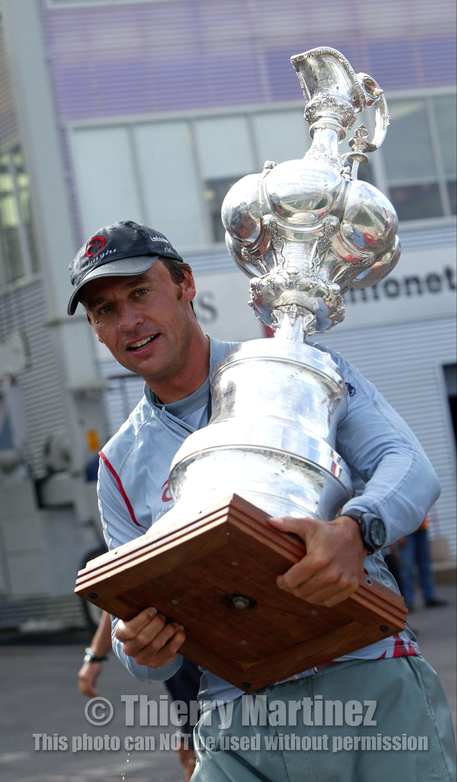 03_1476D © Th.Martinez . Auckland   New Zealand. 2nd March 2003 .America's Cup 2003. Day 5, Alinghi (SUI64) vs Team New Zealand (NZL82). .Alinghi winner of the 31st America's Cup. Ernesto Bertarelli with the Cup!