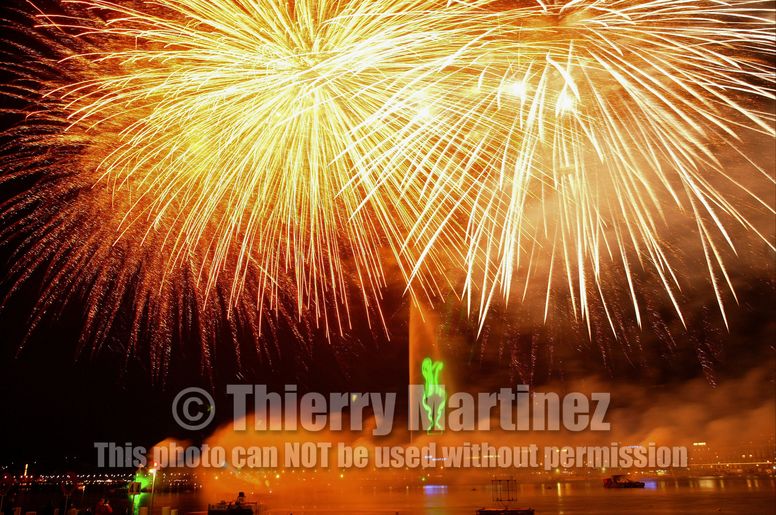 03_2269D ©Th.Martinez .Geneva , Switzerland. America's Cup 2003. 8th March 2003.Alinghi Team winner of America's Cup 2003..Welcome to Alinghi Team in Geneva.Firework and laser show by the lac...