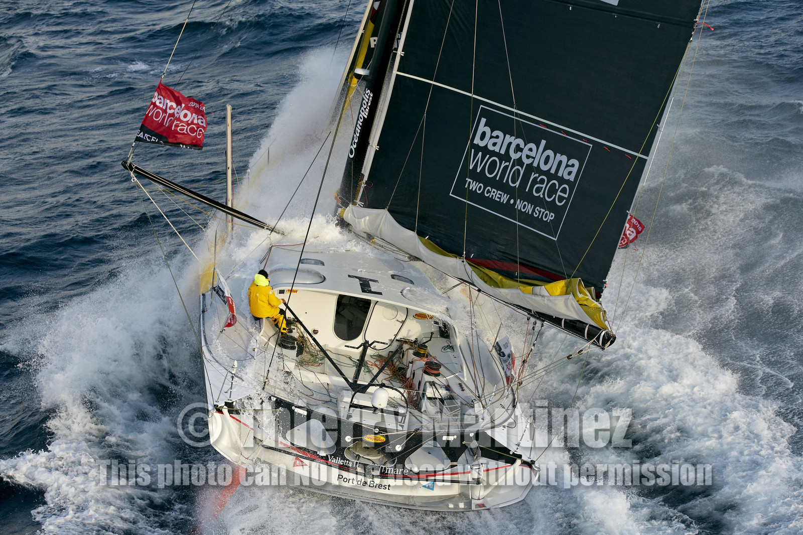 2014 BARCELONA WORLD RACE. Bernard Stamm (SUI) & Jean Le Cam (FRA) on CHEMINEES POUJOULAT
