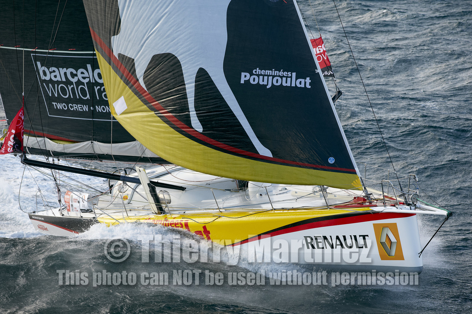2014 BARCELONA WORLD RACE. Bernard Stamm (SUI) & Jean Le Cam (FRA) on CHEMINEES POUJOULAT