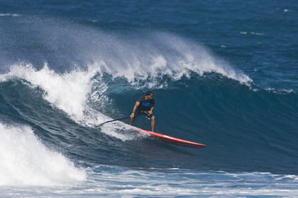 Stand Up Paddle  in waves at Hookip'a Beach - North Shore Maui - Hawaii.