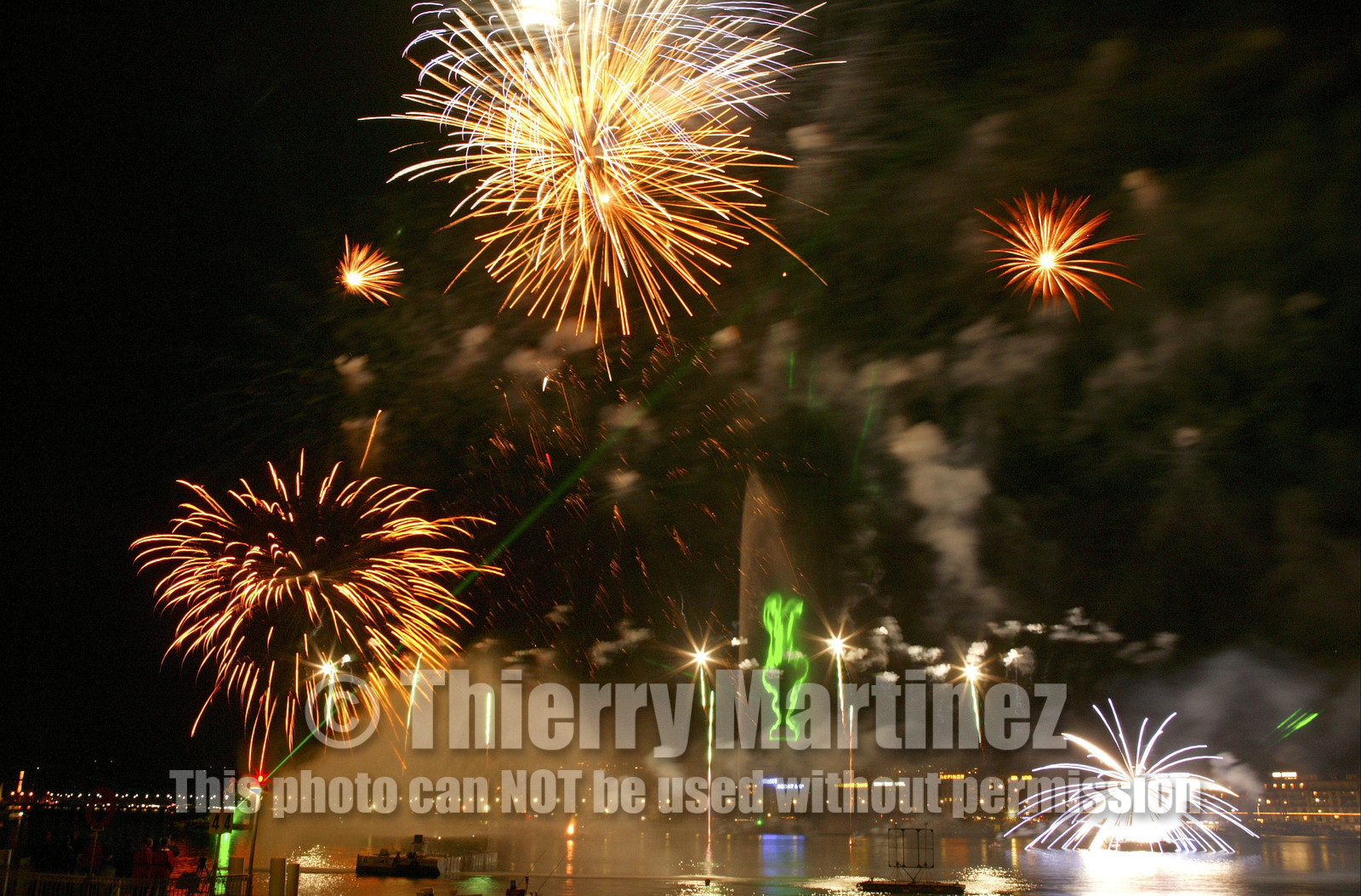 02279D ©Th.Martinez .Geneva , Switzerland. America's Cup 2003. 8th March 2003.Alinghi Team winner of America's Cup 2003..Welcome to Alinghi Team in Geneva.Firework and laser show by the lac...