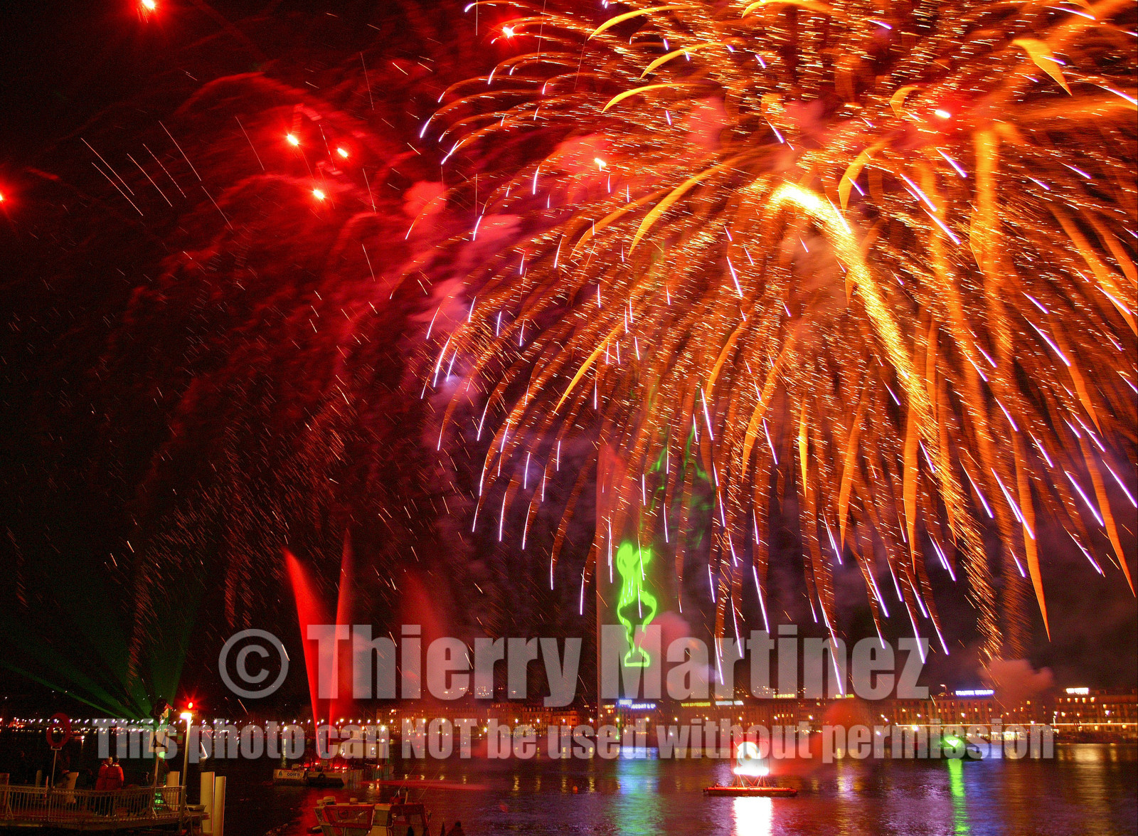 03_2267D ©Th.Martinez .Geneva , Switzerland. America's Cup 2003. 8th March 2003.Alinghi Team winner of America's Cup 2003..Welcome to Alinghi Team in Geneva.Firework and laser show by the lac...