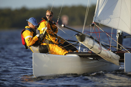 03_3210D © Th.Martinez,STOCKHOLM - SWEDEN10 07 03-Archipelago Raid (2003). Start from Marieham (Finland).Leg4: Team Nokia - Kempff , Magnus Nordstrom looking at the map and Joakim Kempff at the helm.