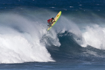 Stand Up Paddle  in waves at Hookip'a Beach - North Shore Maui - Hawaii.