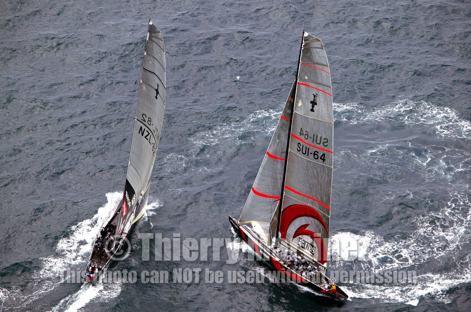 03_0972D © Th.Martinez . Auckland   New Zealand. 18th February 2003 America's Cup 2003, Day 3 Alinghi(SUI64) vs Team New Zealand(NZL82) Start.