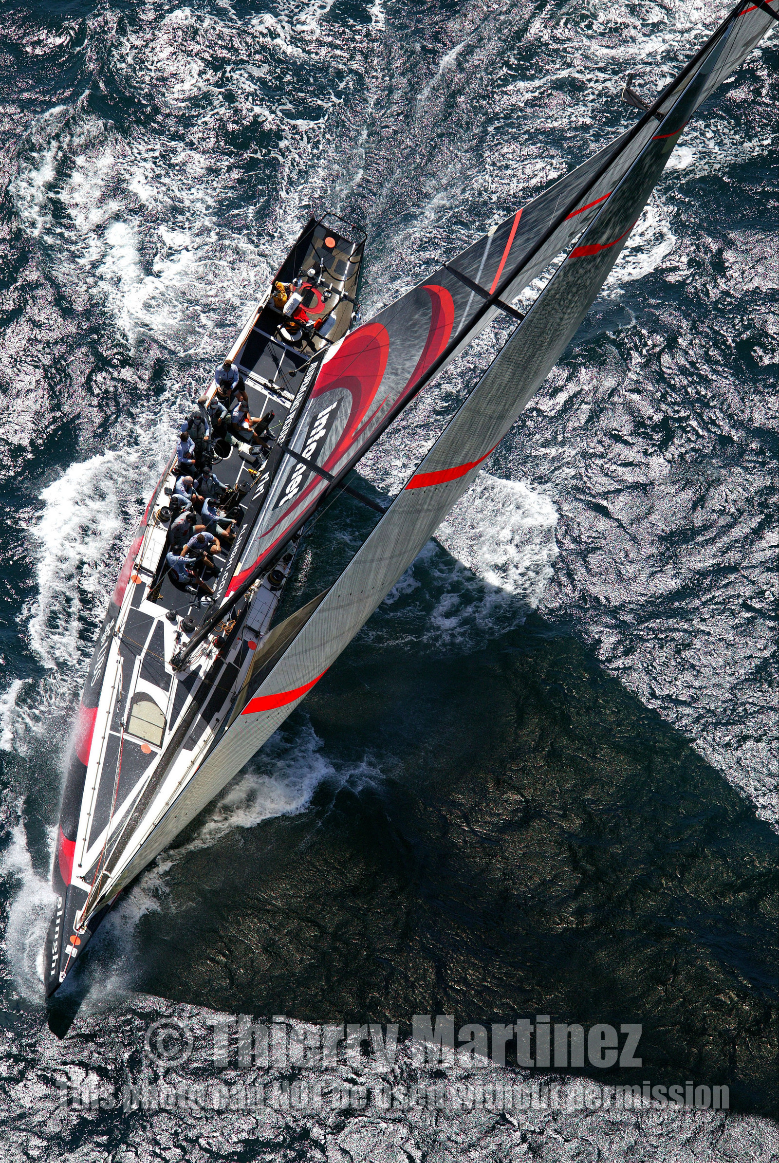 03_0919D © Th.Martinez. Auckland   New Zealand. 15 02 03 America's Cup Day 1.Alinghi (SUI64) vs Team New Zealand (NZL82) SUI64 saliling alone during race 1