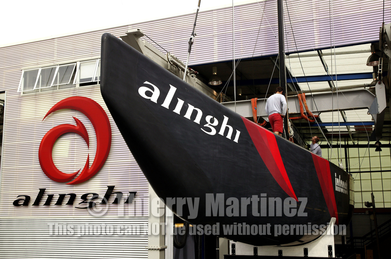 03_1068D © Th.Martinez Auckland   New Zealand. 24th February 2003  America's Cup 2003. Day 4, Race cancelled lack of wind. Alinghi (SUI64) vs Team New Zealand (NZL82)For fourth times in row race day 4 of the America's Cup 2003 have been cancelled. The two race boat have been left in sheds. SUI 64.