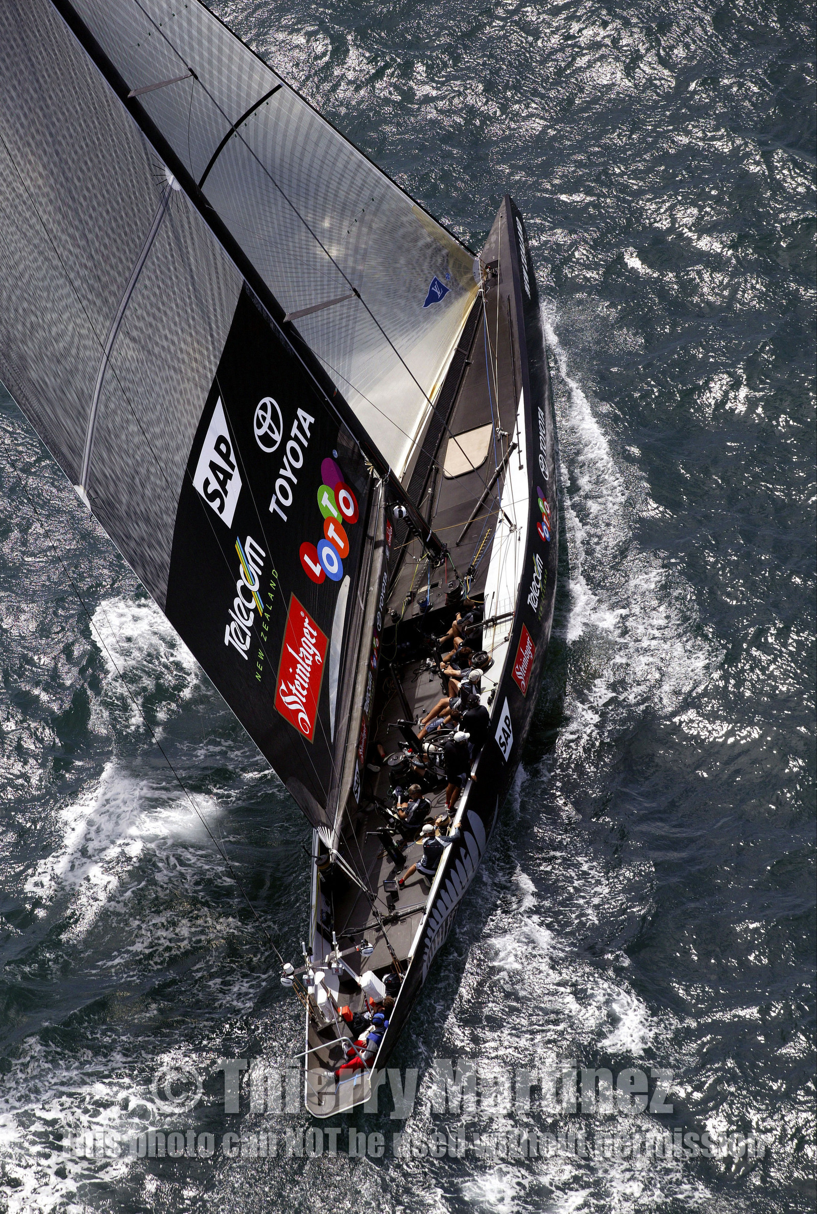 03_0189D ©Th.Martinez - Auckland (NZ) . America's Cup 2003. 18th February 2003. Day 3..Alinghi (SUI 64) vs Team NZ (NZL 82) NZL 82 upwind..