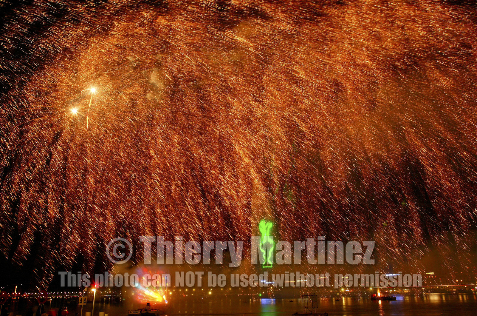 03_2270D ©Th.Martinez .Geneva , Switzerland. America's Cup 2003. 8th March 2003.Alinghi Team winner of America's Cup 2003..Welcome to Alinghi Team in Geneva.Firework and laser show by the lac...