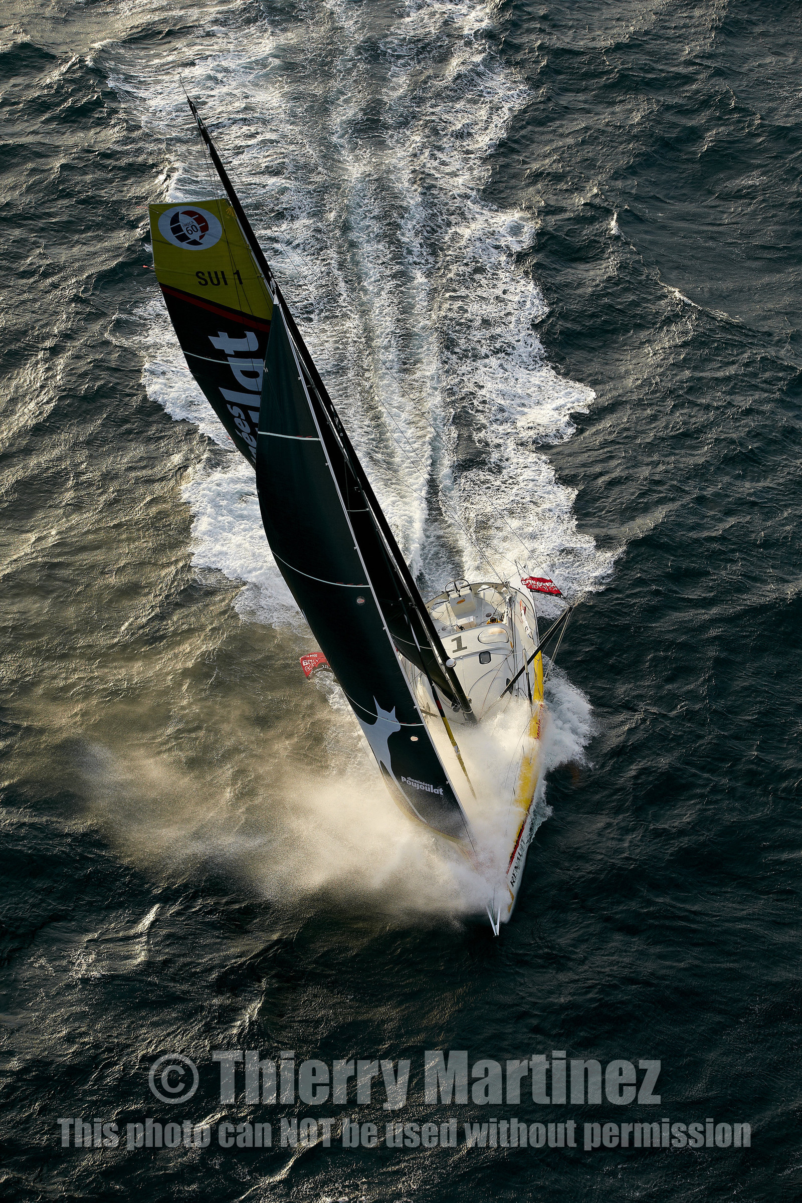 2014 BARCELONA WORLD RACE. Bernard Stamm (SUI) & Jean Le Cam (FRA) on CHEMINEES POUJOULAT