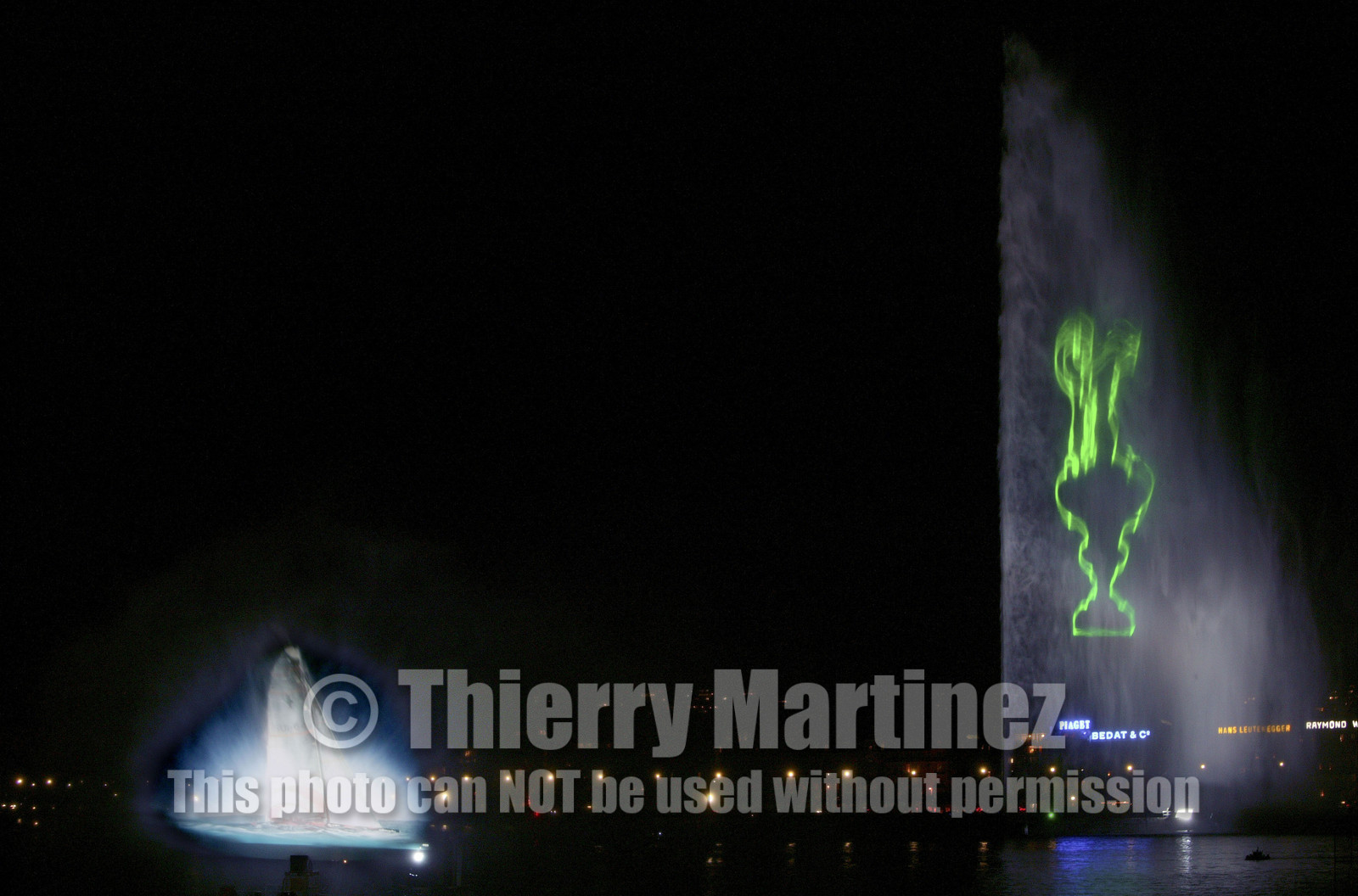 03_2262D ©Th.Martinez .Geneva , Switzerland. America's Cup 2003. 8th March 2003.Alinghi Team winner of America's Cup 2003..Welcome to Alinghi Team in Geneva.Firework and laser show by the lac...