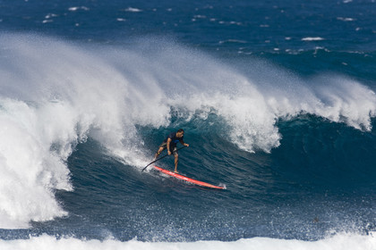 Stand Up Paddle  in waves at Hookip'a Beach - North Shore Maui - Hawaii.