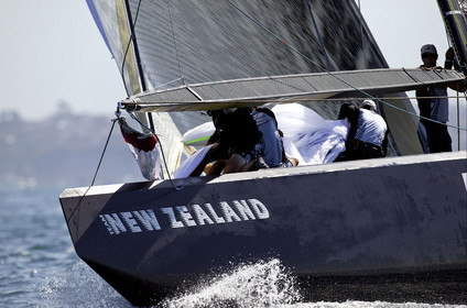 03_0208D ©Th.Martinez - Auckland (NZ) . America's Cup 2003. 18th February 2003. Day 2..Alinghi (SUI 64) vs Team NZ (NZL 82) .Team NZ crew seting up spinnaker at upwind mark...