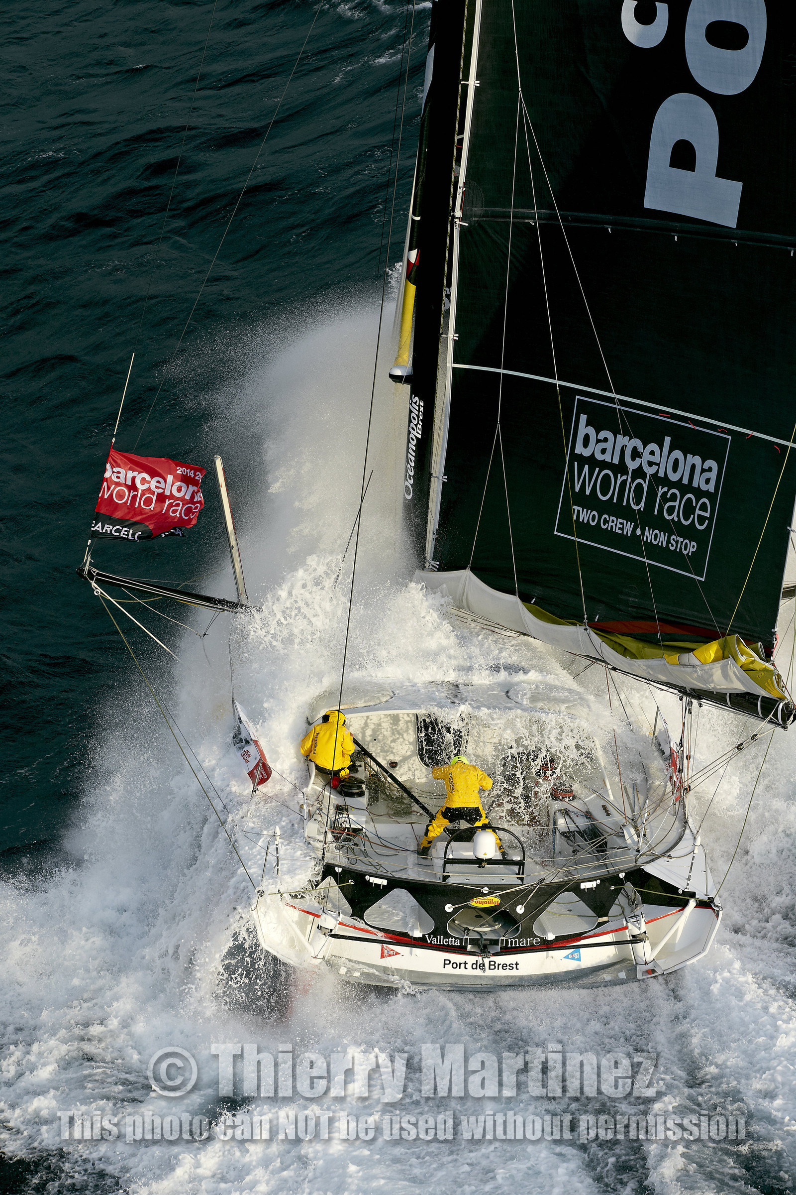 2014 BARCELONA WORLD RACE. Bernard Stamm (SUI) & Jean Le Cam (FRA) on CHEMINEES POUJOULAT